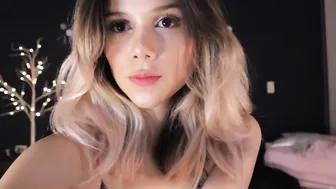 becca Black-haired lady erotically undressed