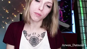 Arwen Datnoid  manyvids busty  cam girl  caresses her lips.