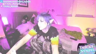 tricky_nymph dancing near the christmas tree